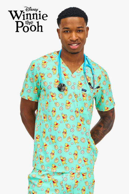 Disney’s Winnie the Pooh Men’s 3-Pocket Scrub Top, Easter Egg Hunt