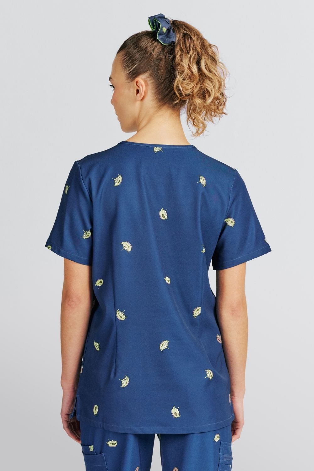 Disney & Pixar’s Toy Story Women’s 3-Pocket Scrub Top, Little Green Men