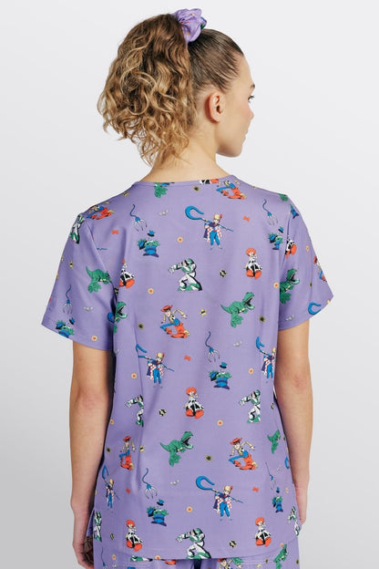 Disney & Pixar’s Toy Story Women’s 3-Pocket Scrub Top, You’ve got a Friend