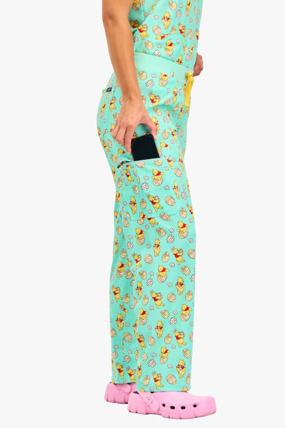 Disney’s Winnie the Pooh Women’s Cargo Scrub Pants, Easter Egg Hunt