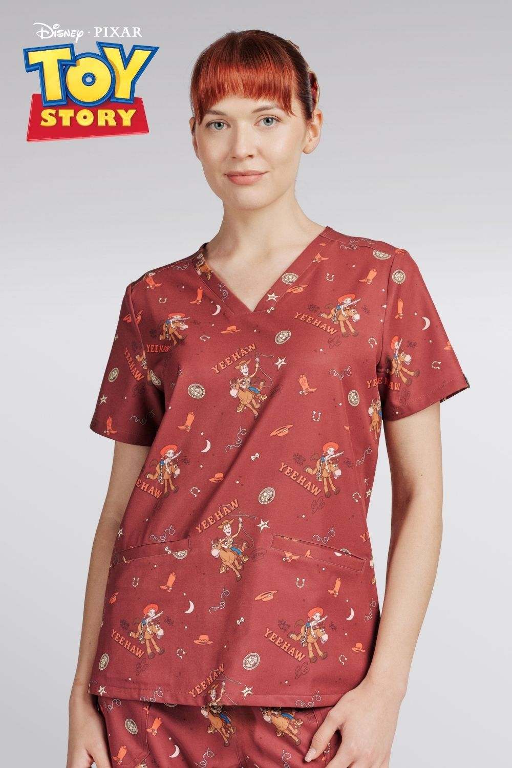 Disney & Pixar’s Toy Story Women’s 3-Pocket Scrub Top, Yeehaw