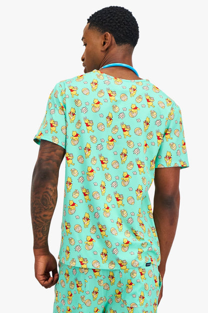 Disney’s Winnie the Pooh Men’s 3-Pocket Scrub Top, Easter Egg Hunt