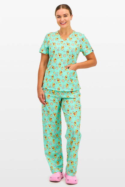 Disney’s Winnie the Pooh Women’s Cargo Scrub Pants, Easter Egg Hunt
