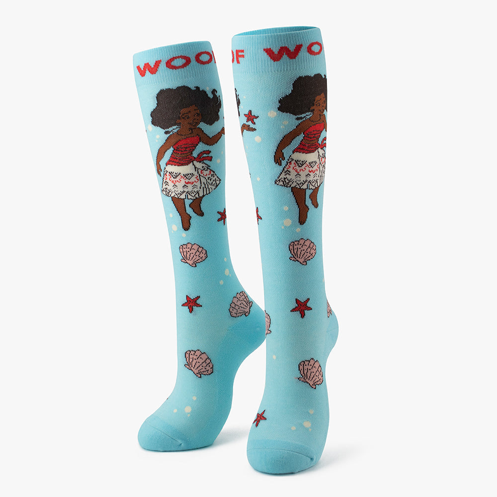Side-by-side standing display of the aqua blue Moana Disney Princess knee-high compression socks.
