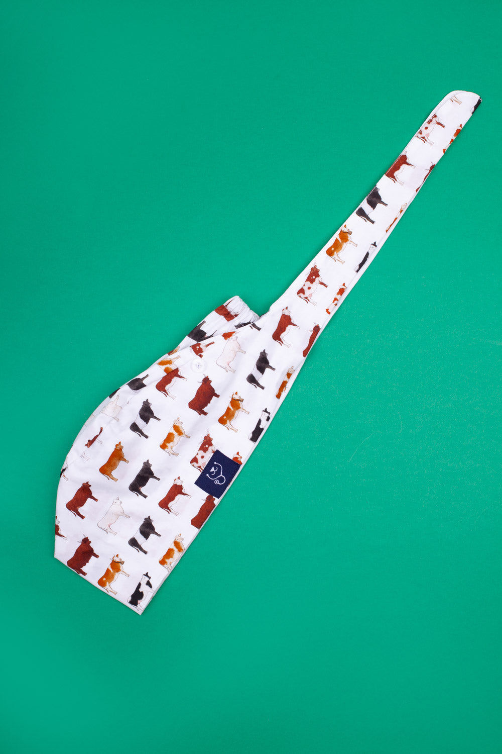 Dr. Woof Cows Surgical Scrub Cap Flatlay 